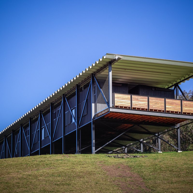 The Bridge is clad in dark LYSAGHT PANELRIB® and SPANDEK®, both made from COLORBOND® steel Monument in a Matt finish