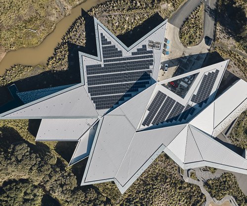 Penguin Parade Visitor Centre featuring roofing made from COLORBOND Ultra steel in the colour Cosmic aerial roof view