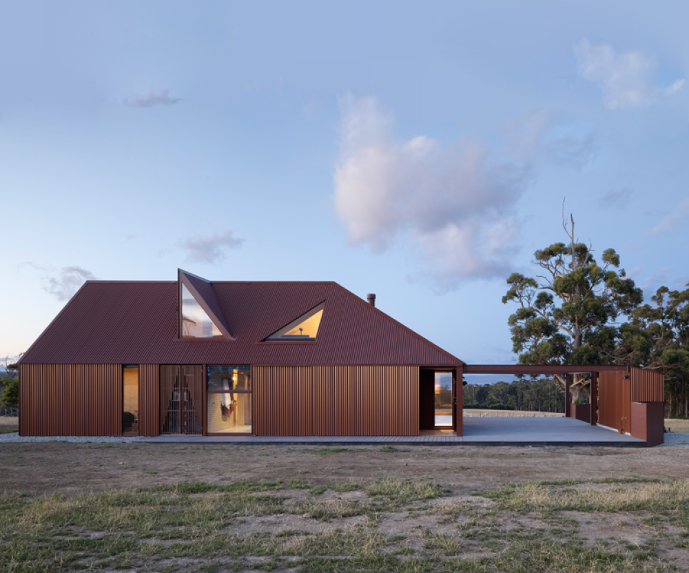 residence on Bruny Island uses LYSAGHT CUSTOM ORB® cladding made from COLORBOND® steel in colour Terrain® 